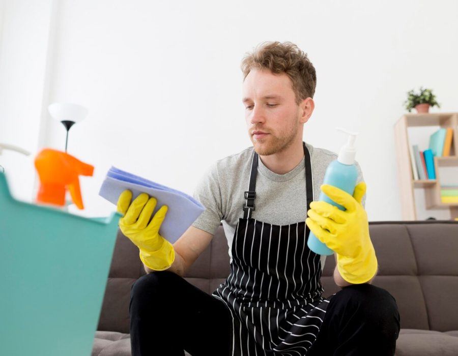 low-angle-man-cleaning_23-2148514814